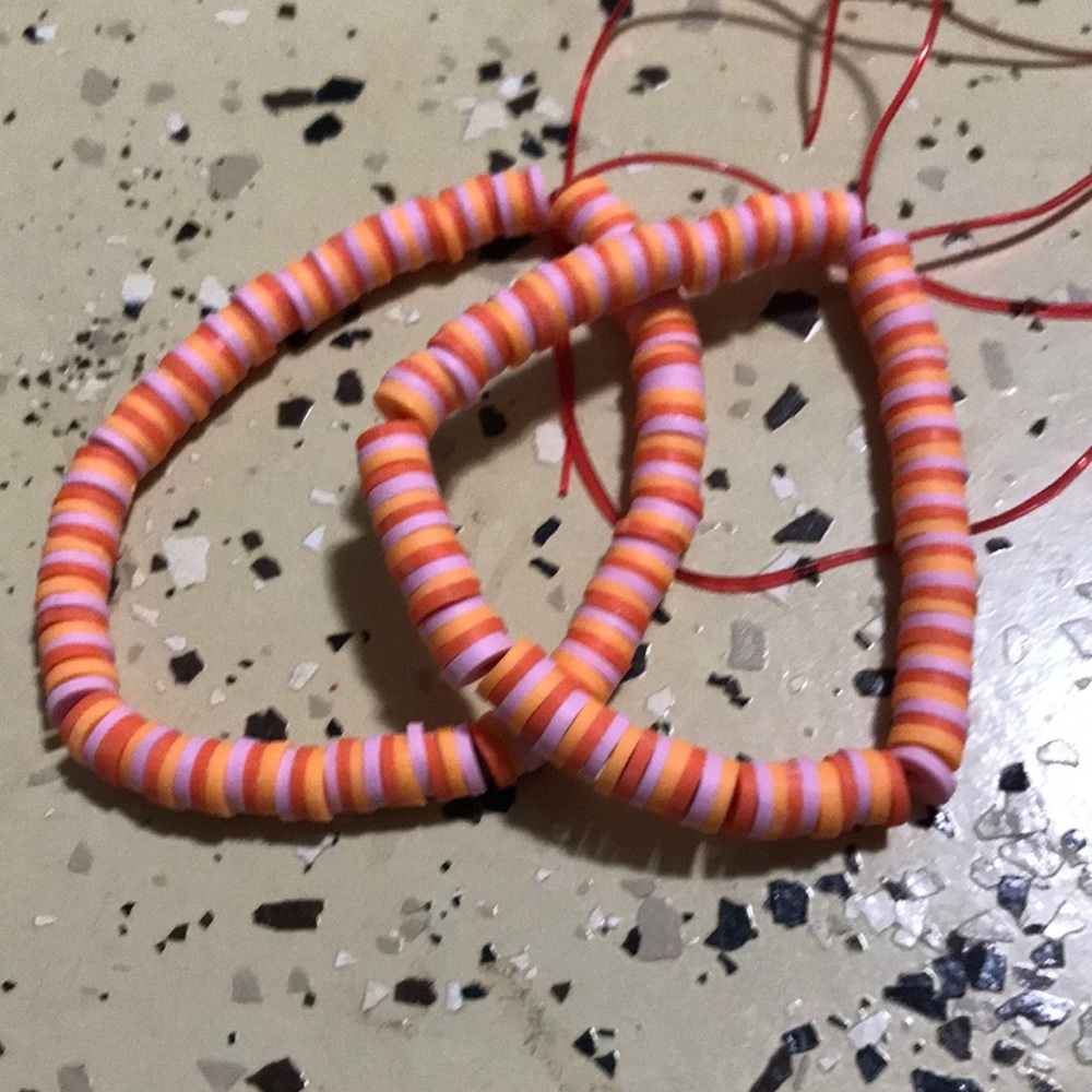 Orange pink and rustic clay beads bracelets!!